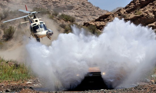 Volkswagen's Nasser Al-Attiyah, from Qatar, and co-driver Timo Gottschalk, from Germany, compete in the 11th stage of the 2011 Argentina-Chile Dakar Rally between Chilecito and San Juan, Argentina, Thursday,Jan. 13, 2011. (AP Photo/Natacha Pisarenko)